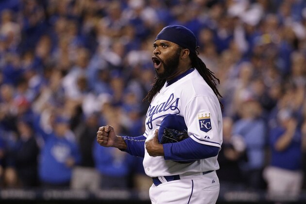 Kansas City Royals starting pitcher Johnny Cueto reacts as he walks off the field after pitching in the eighth inning of Game 5 in baseball's American League Division Series against the Houston Astros, Wednesday, Oct. 14, 2015, in Kansas City, Mo. (AP Photo/Charlie Riedel)
