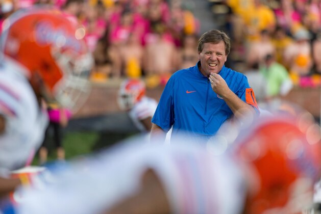 Florida head coach Jim McElwain watches his players warm up before the start of an NCAA college football game against Missouri Saturday, Oct. 10, 2015, in Columbia, Mo.  (AP Photo/L.G. Patterson)