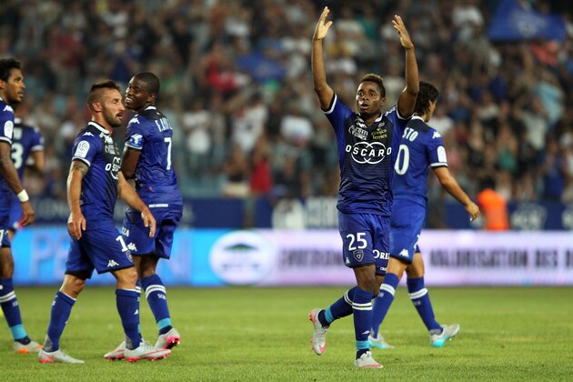 Bastia's Guinean forward Francois Kamano celebrates after scoring a goal during the French L1 football match Bastia (SCB) against Rennes (SRFC) on August 8, 2015 in the Armand Cesari stadium in Bastia, on the French Mediterranean island of Corsica. AFP PHOTO / PASCAL POCHARD-CASABIANCA        (Photo credit should read PASCAL POCHARD-CASABIANCA/AFP/Getty Images)