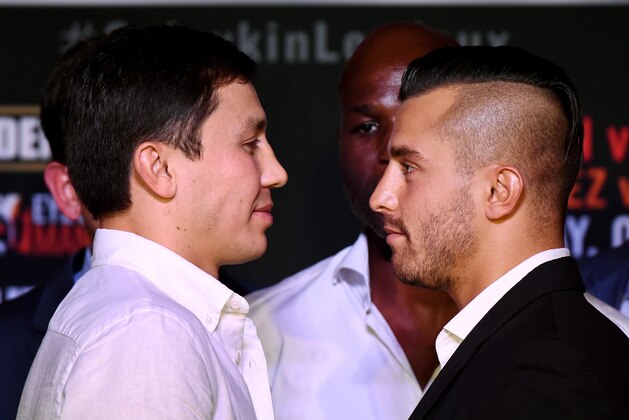 Boxers Gennady 'GGG' Golovkin of Kazakhstan (L) and David Lemieux of Canada (R) face off during their press conference to promote their upcoming Middleweight World Championship Title Unification bout, in Los Angeles, California on August 20, 2015.  The fight will take place at Madison Square Garden in New York on Saturday, October 17.           AFP PHOTO / MARK RALSTON        (Photo credit should read MARK RALSTON/AFP/Getty Images)