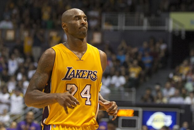 Los Angeles Lakers guard Kobe Bryant (24) is seen on the court during the second half of an NBA preseason basketball game against the Utah Jazz, Tuesday, Oct. 6, 2015, in Honolulu.  The Jazz defeated the Lakers 117-114.  (AP Photo/Marco Garcia)