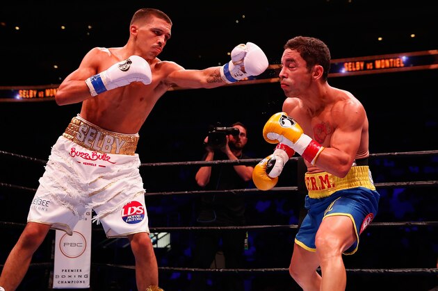 GLENDALE, AZ - OCTOBER 14:  Lee Selby (L) throws a left on Fernando Montiel during the IBF featherweight championship title bout at Gila River Arena on October 14, 2015 in Glendale, Arizona.  (Photo by Christian Petersen/Getty Images)