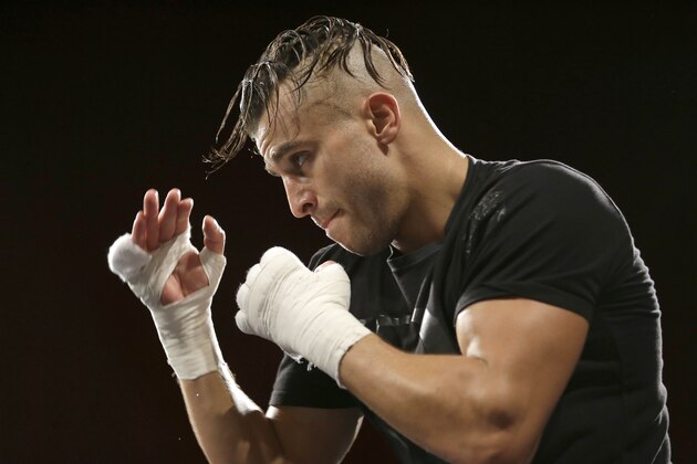 Boxer David Lemieux works out in front of the media in New York, Tuesday, Oct. 13, 2015. Lemieux will fight Gennady Golovkin in New York on Oct. 17,  at Madison Square Garden. (AP Photo/Seth Wenig)