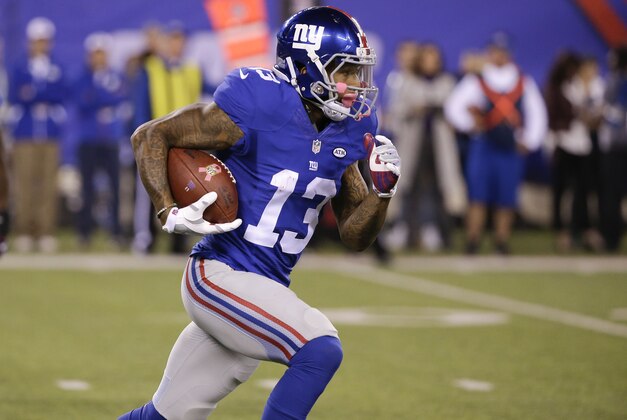 New York Giants wide receiver Odell Beckham (13) runs the ball against the San Francisco 49ers during the fourth quarter of an NFL football game, Sunday, Oct. 11, 2015, in East Rutherford, N.J. (AP Photo/Seth Wenig)
