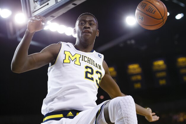 Jan 10, 2015; Ann Arbor, MI, USA; Michigan Wolverines guard Caris LeVert (23) dunks in the first half against the Minnesota Golden Gophers at Crisler Center. Mandatory Credit: Rick Osentoski-USA TODAY Sports
