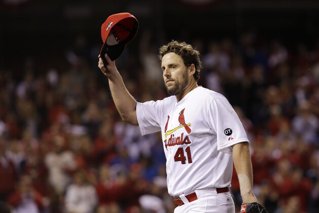 St. Louis Cardinals starting pitcher John Lackey (41) acknowledges the crowd after being taken out during the eighth inning of Game 1 in baseball's National League Division Series against the Chicago Cubs, Friday, Oct. 9, 2015, in St. Louis. (AP Photo/Jeff Roberson)