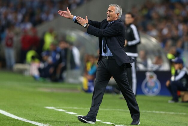 Chelsea manager Jose Mourinho gestures during the Champions League group G soccer match between FC Porto and Chelsea FC at the Dragao stadium in Porto, Portugal, Tuesday, Sept. 29, 2015.  (AP Photo/Steven Governo)