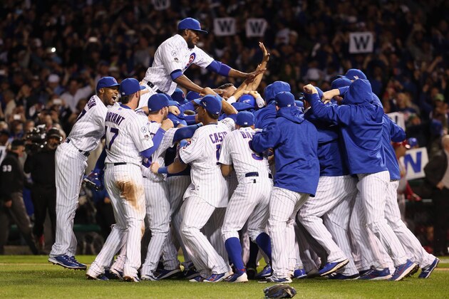 CHICAGO, IL - OCTOBER 13:  The Chicago Cubs celebrate defeating the St. Louis Cardinals 6-4 in game four of the National League Division Series at Wrigley Field on October 13, 2015 in Chicago, Illinois.  (Photo by Jonathan Daniel/Getty Images)