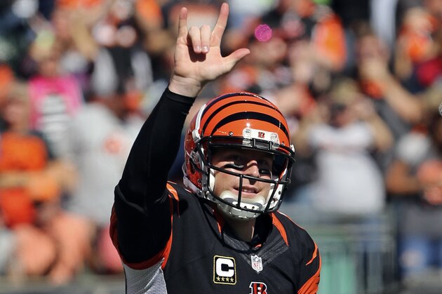 Oct 11, 2015; Cincinnati, OH, USA; Cincinnati Bengals quarterback Andy Dalton (14) celebrates a pass for a touchdown to tight end Tyler Eifert (not pictured) in the first half against the Seattle Seahawks at Paul Brown Stadium. Mandatory Credit: Aaron Doster-USA TODAY Sports