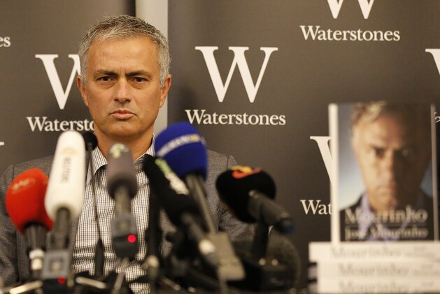 Chelsea football club manager Jose Mourinho speaks during a press conference to promote the book 'Mourinho' after an autograph session at a book store in London, Thursday, Oct. 15, 2015.  (AP Photo/Frank Augstein)