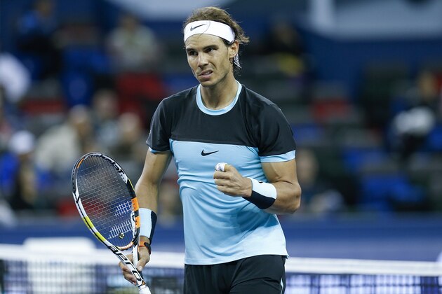 SHANGHAI, CHINA - OCTOBER 15:  Rafael Nadal of Spain celebrates a point against Milos Raonic of Canada during the men's singles third round match  on day 5 of Shanghai Rolex Masters at Qi Zhong Tennis Centre on October 15, 2015 in Shanghai, China.  (Photo by Lintao Zhang/Getty Images)