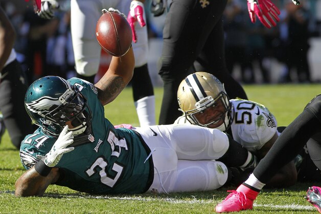 PHILADELPHIA, PA - OCTOBER 11: Ryan Mathews #24 of the Philadelphia Eagles is tackled in the end zone by Stephone Anthony #50 the New Orleans Saints in the third quarter during a football game at Lincoln Financial Field on October 11, 2015 in Philadelphia, Pennsylvania. 39-17. (Photo by Rich Schultz /Getty Images)