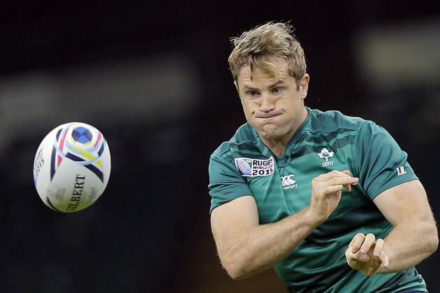 Ireland's Jamie Heaslip, passes the ball during a training session at the Millennium Stadium, Cardiff, Friday, Oct. 16, 2015. Ireland will play Argentina during their Rugby World Cup quarterfinal match on Sunday, Oct. 18. (AP Photo/Christophe Ena)