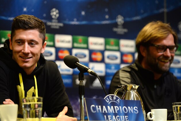 Dortmund's head coach Juergen Klopp (R) and Dortmund's Polish striker Robert Lewandowski attend a press conference on April 7, 2014 in Dortmund on the eve of the second leg of the UEFA Champions League football qualification match against Real Madrid. AFP PHOTO / PATRIK STOLLARZ        (Photo credit should read PATRIK STOLLARZ/AFP/Getty Images)