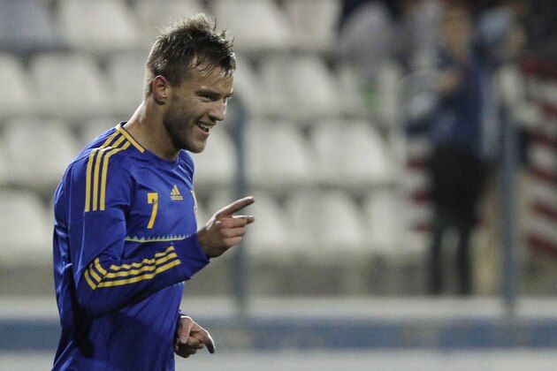 Andriy Yarmolenko of Ukraine celebrates his goal against U.S. during an international friendly match at Antonis Papadopoulos stadium in southern city of Larnaca, Cyprus, Wednesday, March 5, 2014. The Ukrainians are facing the United States in a friendly in Cyprus, a match moved from Kharkiv, Ukraine, to Larnaca for security reasons. (AP Photo/Petros Karadjias)