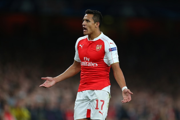 LONDON, ENGLAND - SEPTEMBER 29:  Alexis Sanchez of Arsenal shrugs his shoulders during the UEFA Champions League match between Arsenal and Olympiacos at the Emirates Stadium on September 29, 2015 in London, United Kingdom.  (Photo by Catherine Ivill - AMA/Getty Images)