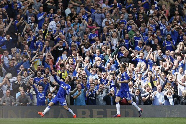 Chelsea's Eden Hazard, left,, celebrates with Nemanja Matic after scoring the opening goal during the English Premier League soccer match between Chelsea and Crystal Palace at Stamford Bridge stadium in London, Sunday, May 3, 2015.   (AP Photo/Kirsty Wigglesworth)