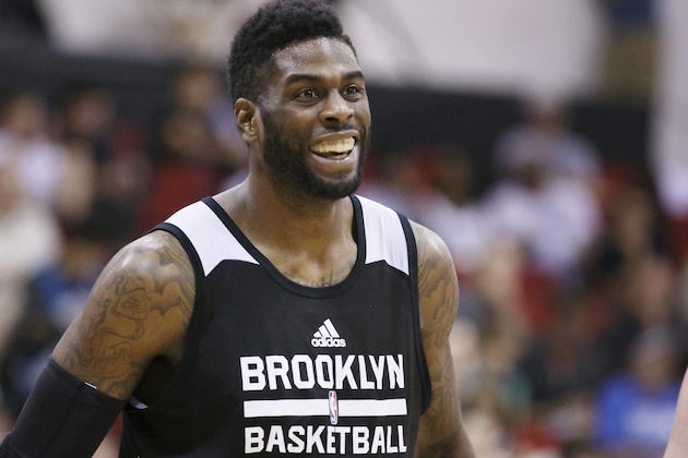 Brooklyn Nets' Willie Reed laughs during a pause in action during the first half of an NBA summer league basketball game against the Chicago Bulls on Tuesday, July 14, 2015, in Las Vegas. The Nets won 87-86. (AP Photo/Ronda Churchill)