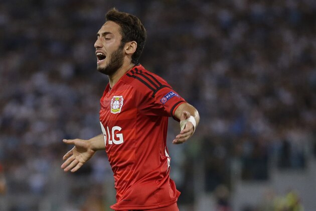 Leverkusen's Hakan Calhanoglu reacts after his goal was canceled during a qualifying round, first leg Champions League soccer match between Lazio and Bayer Leverkusen, at Rome's Olympic Stadium, Tuesday, Aug. 18, 2015. (AP Photo/Andrew Medichini)