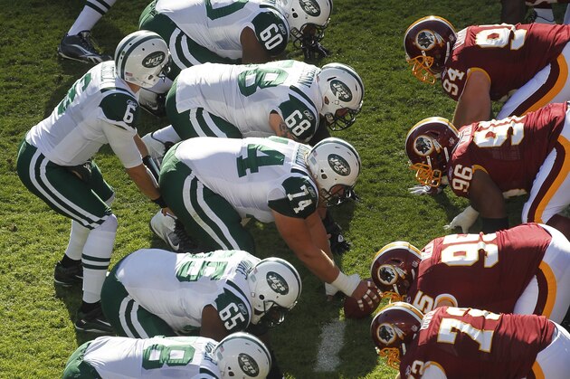 The New York Jets face off against the Washington Redskins during the first half of an NFL football game in Landover, Md., Sunday, Dec. 4, 2011.  (AP Photo/Pablo Martinez Monsivais)