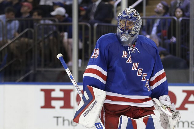 New York Rangers goalie Henrik Lundqvist (30) skates back to the crease during a break in play against the Tampa Bay Lightning during the third period of Game 5 of the Eastern Conference final during the NHL hockey Stanley Cup playoffs, Sunday, May 24, 2015, in New York. The Lightning won 2-0.  (AP Photo/Frank Franklin)