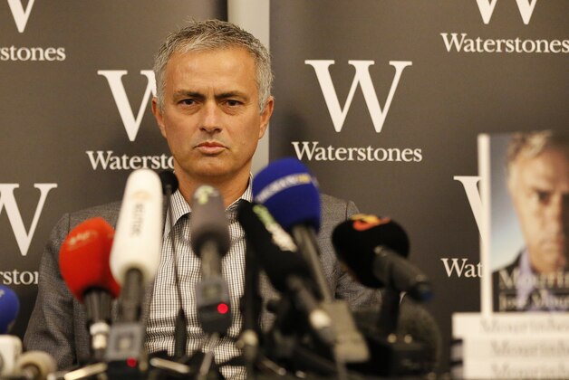 Chelsea football club manager Jose Mourinho speaks during a press conference to promote the book 'Mourinho' after an autograph session at a book store in London, Thursday, Oct. 15, 2015.  (AP Photo/Frank Augstein)