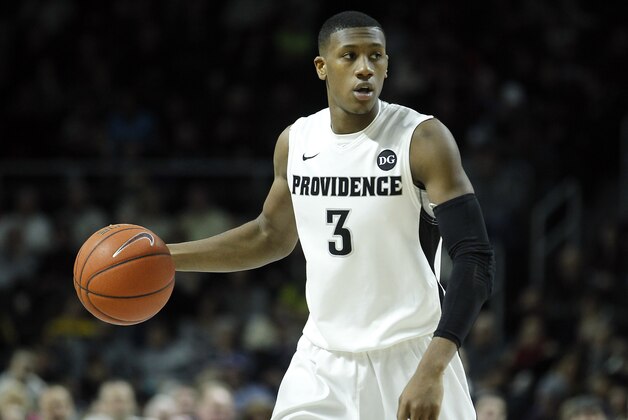 Providence guard Kris Dunn (3) during the second half of an NCAA college basketball game against Marquette Sunday, March 1, 2015, in Providence, R.I.  Providence defeated Marquette, 77-66. (AP Photo/Stew Milne)