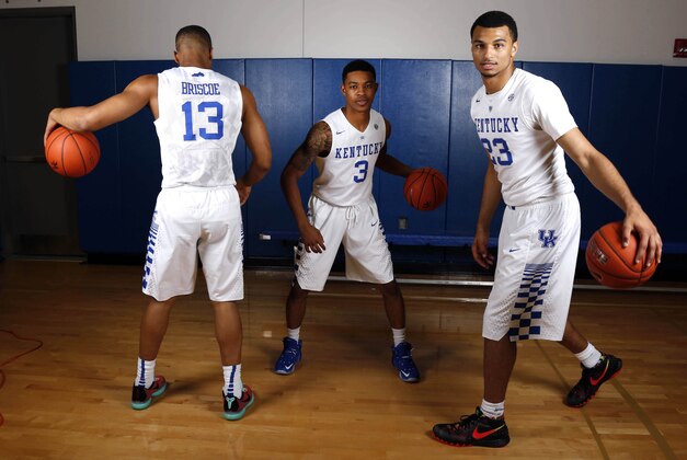 Sep 24, 2015; Lexington, KY, USA; Kentucky Wildcats guard Tyler Ulis (3), guard Jamal Murray (23) and guard Isaiah Briscoe (13) dribble the ball during Kentucky photo day at Memorial Coliseum. Mandatory Credit: Mark Zerof-USA TODAY Sports
