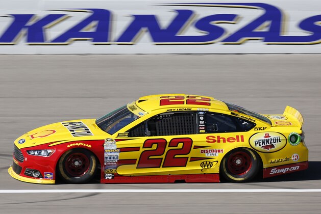 NASCAR Sprint Cup Series auto racing driver Joey Logano takes a practice lap at Kansas Speedway in Kansas City, Kan., Friday, Oct. 16, 2015. (AP Photo/Colin E. Braley)