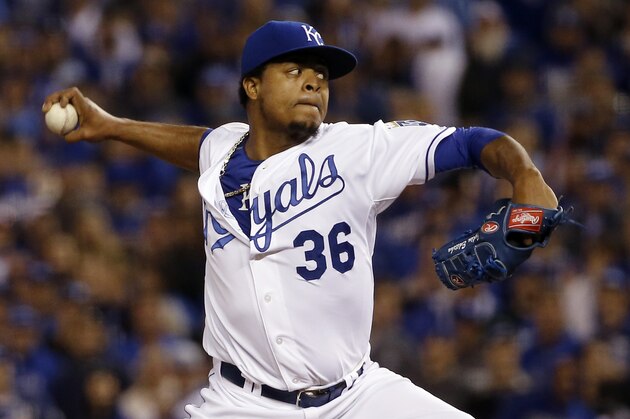 Kansas City Royals starting pitcher Edinson Volquez throws against the Toronto Blue Jays during the first inning in Game 1 of baseball's American League Championship Series, Friday, Oct. 16, 2015, in Kansas City, Mo. (AP Photo/Matt Slocum)