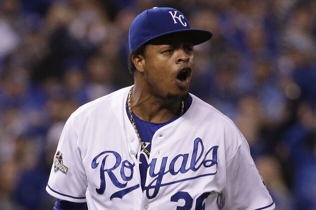 Kansas City Royals starting pitcher Edinson Volquez celebrates after the last out in the top of the sixth inning against the Toronto Blue Jays in Game 1 of baseball's American League Championship Series on Friday, Oct. 16, 2015, in Kansas City, Mo. (AP Photo/Charlie Riedel)