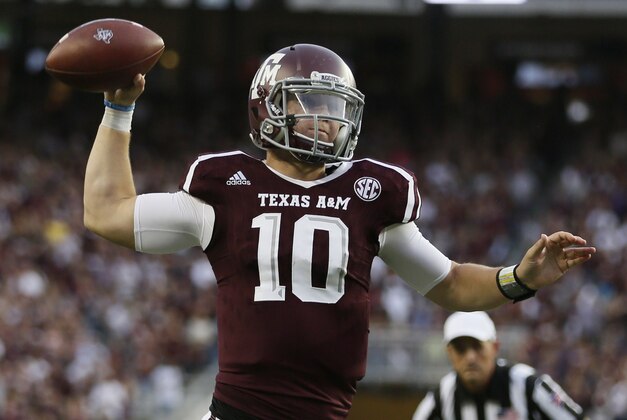 Oct 3, 2015; College Station, TX, USA; Texas A&M Aggies quarterback Kyle Allen (10) throws a touchdown pass to wide receiver Ricky Seals-Jones (not pictured) against the Mississippi State Bulldogs during the first half at Kyle Field. Mandatory Credit: Soobum Im-USA TODAY Sports