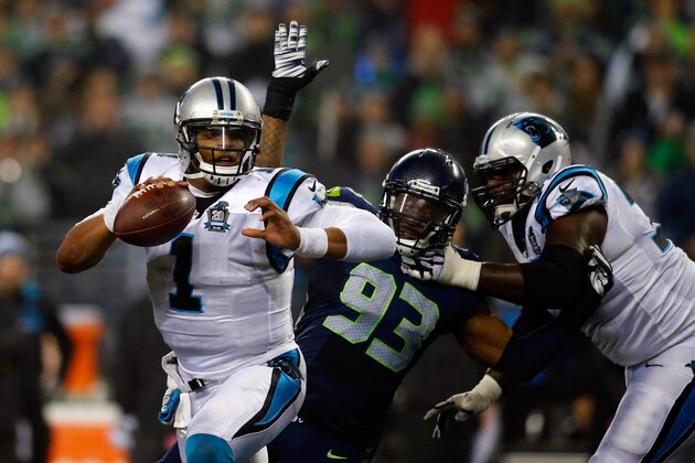 SEATTLE, WA - JANUARY 10:  Cam Newton #1 of the Carolina Panthers in action against the Seattle Seahawks during the 2015 NFC Divisional Playoff game at CenturyLink Field on January 10, 2015 in Seattle, Washington.  (Photo by Jonathan Ferrey/Getty Images)