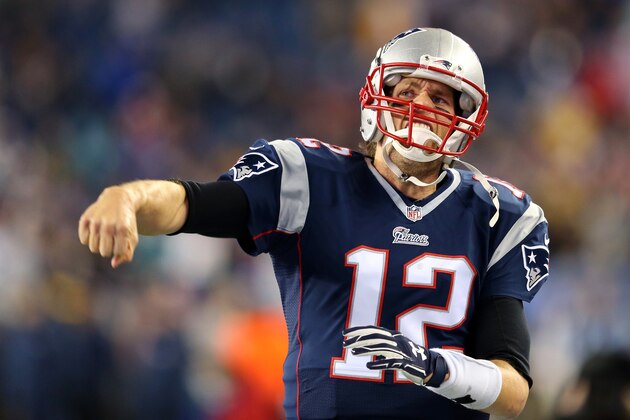 FOXBORO, MA - JANUARY 18:  Tom Brady #12 of the New England Patriots warms up before the 2015 AFC Championship Game against the Indianapolis Colts at Gillette Stadium on January 18, 2015 in Foxboro, Massachusetts.  (Photo by Jim Rogash/Getty Images)