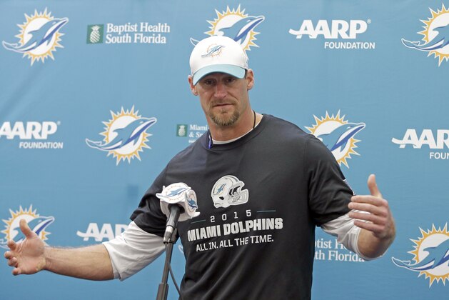 Miami Dolphins head coach Dan Campbell talks to reporters after an NFL football practice, Thursday, Oct. 15, 2015, in Davie, Fla. (AP Photo/Alan Diaz)