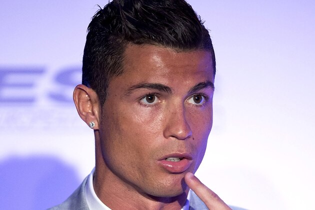 MADRID, SPAIN - OCTOBER 13:  Real Madrid football player Cristiano Ronaldo gestures during his speech after receiving his fourth Golden Boot Award as maximun goal scorer of European leagues at The Westin Palace Hotel on October 13, 2015 in Madrid, Spain.  (Photo by Gonzalo Arroyo Moreno/Getty Images)