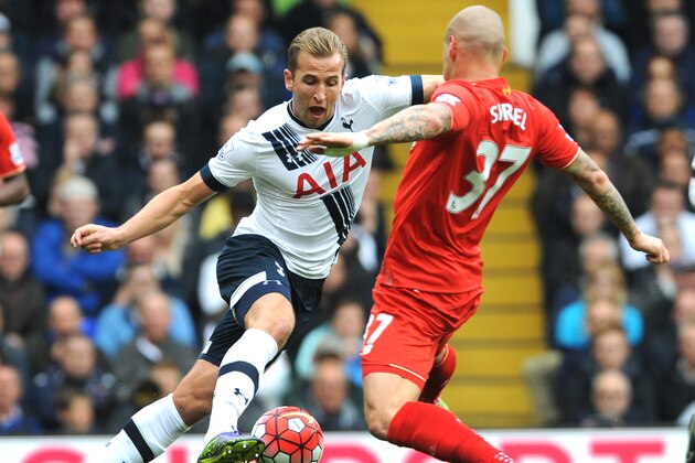 Tottenham’s Harry Kane, left, battles with Liverpool’s Martin Skrtel during the English Premier League soccer match between Tottenham Hotspur and Liverpool at the White Hart Lane, London, England, Saturday, Oct. 17, 2015. (AP Photo/Rui Vieira)