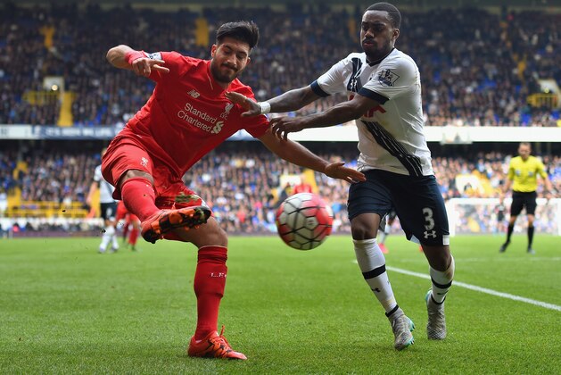 LONDON, ENGLAND - OCTOBER 17: Emre Can of Liverpool and Danny Rose of Tottenham Hotspur compete for the ball during the Barclays Premier League match between Tottenham Hotspur and Liverpool at White Hart Lane on October 17, 2015 in London, England.  (Photo by Michael Regan/Getty Images)
