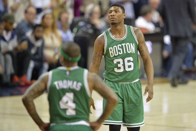 Apr 21, 2015; Cleveland, OH, USA; Boston Celtics guard Marcus Smart (36) and guard Isaiah Thomas (4) reacts in the fourth quarter against the Cleveland Cavaliers in game two of the first round of the NBA Playoffs at Quicken Loans Arena. Mandatory Credit: David Richard-USA TODAY Sports