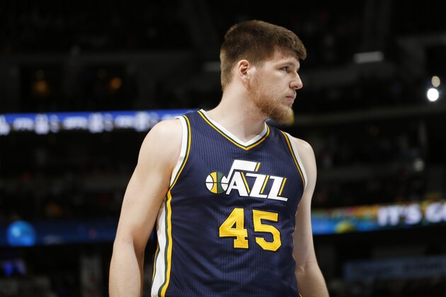 Utah Jazz forward Jack Cooley looks on against the Denver Nuggets late in the fourth quarter of an NBA basketball game Friday, March 27, 2015, in Denver. The Nuggets won 107-91. (AP Photo/David Zalubowski)