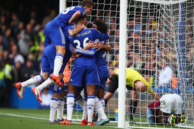 LONDON, ENGLAND - OCTOBER 17: Chelsea players celebrate their team's first goal by Diego Costa (obscured) during the Barclays Premier League match between Chelsea and Aston Villa at Stamford Bridge on October 17, 2015 in London, England.  (Photo by Clive Rose/Getty Images)