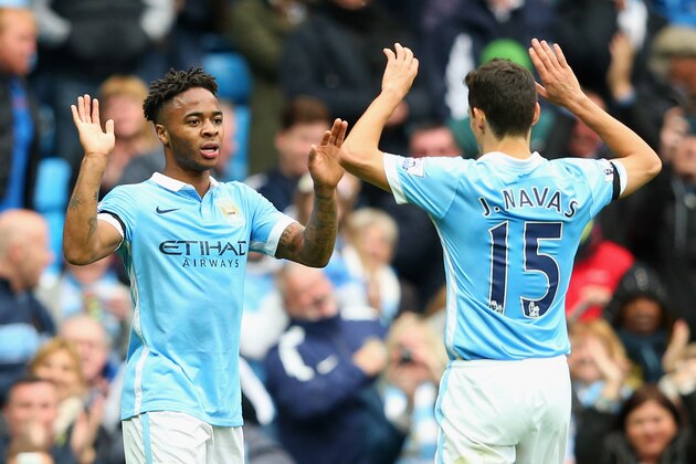 MANCHESTER, ENGLAND - OCTOBER 17:  Raheem Sterling of Manchester City celebrates scoring his team's fourth and hat trick goal with his team mates during the Barclays Premier League match between Manchester City and A.F.C. Bournemouth at Etihad Stadium on October 17, 2015 in Manchester, England.  (Photo by Alex Livesey/Getty Images)