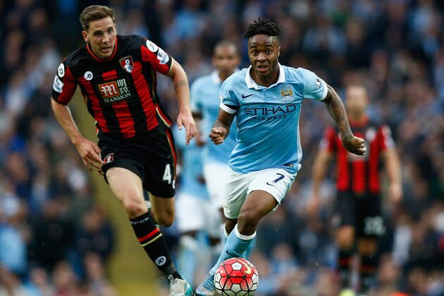 MANCHESTER, ENGLAND - OCTOBER 17: Raheem Sterling of Manchester City and Dan Gosling of Bournemouth compete for the ball during the Barclays Premier League match between Manchester City and A.F.C. Bournemouth at Etihad Stadium on October 17, 2015 in Manchester, England.  (Photo by Dean Mouhtaropoulos/Getty Images)