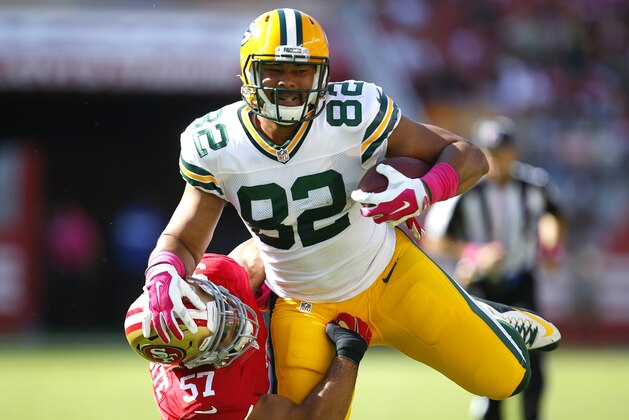 Green Bay Packers tight end Richard Rodgers (82) is tackled by San Francisco 49ers inside linebacker Michael Wilhoite (57) after making a catch during an NFL football game in Santa Clara, Calif., Sunday, Oct. 4, 2015. (Jeff Haynes/AP Images for Panini)