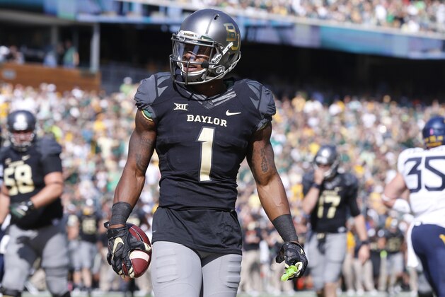 Baylor wide receiver Corey Coleman (1) looks toward the end zone after scoring against West Virginia in the first half of an NCAA college football game, Saturday, Oct 17, 2015, in Waco, Texas. (AP Photo/Rod Aydelotte)
