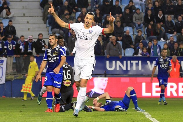 Paris Saint-Germain's Swedish forward Zlatan Ibrahimovic celebrates after scoring during the L1 football match Bastia (SCB) against Paris (PSG) on October 17, 2015, at the Armand Cesari stadium in Bastia, on the French Mediterranean island of Corsica.  AFP PHOTO / PASCAL POCHARD-CASABIANCA        (Photo credit should read PASCAL POCHARD CASABIANCA/AFP/Getty Images)