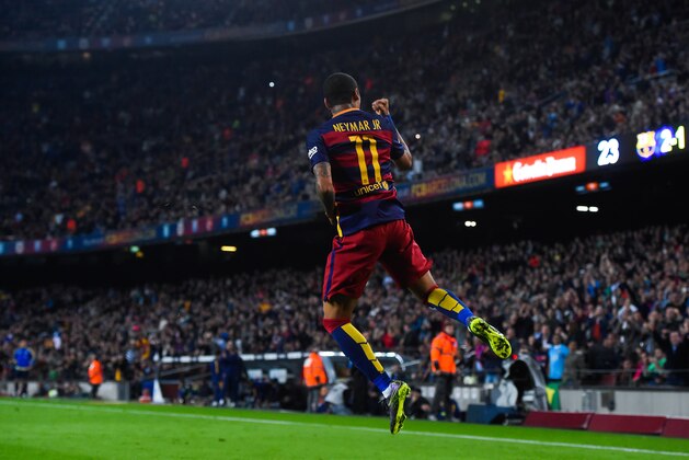 BARCELONA, SPAIN - OCTOBER 17:  Neymar of FC Barcelona celebrates after scoring his team's third goal during the La Liga match between FC Barcelona and Rayo Vallecano at the Camp Nou stadium on October 17, 2015 in Barcelona, Spain.  (Photo by David Ramos/Getty Images)