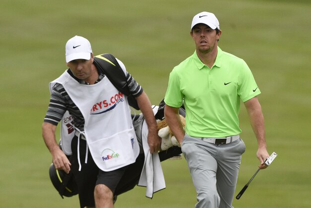 October 17, 2015; Napa, CA, USA; Rory McIlroy (right) with his caddie walks up to the first hole during the third round of the Frys.com Open at Silverado Country Club. Mandatory Credit: Kyle Terada-USA TODAY Sports