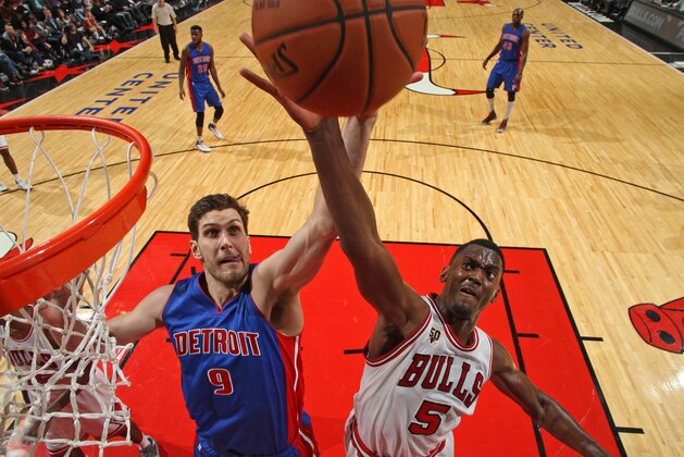 CHICAGO, IL - OCTOBER 14:  Jordan Bachynski #9 of the Detroit Pistons and Bobby Portis #5 of the Chicago Bulls go up for a rebound during the preseason game on October 14, 2015 at United Center in Chicago, Illinois. NOTE TO USER: User expressly acknowledges and agrees that, by downloading and or using this Photograph, user is consenting to the terms and conditions of the Getty Images License Agreement. Mandatory Copyright Notice: Copyright 2015 NBAE (Photo by Gary Dineen/NBAE via Getty Images)