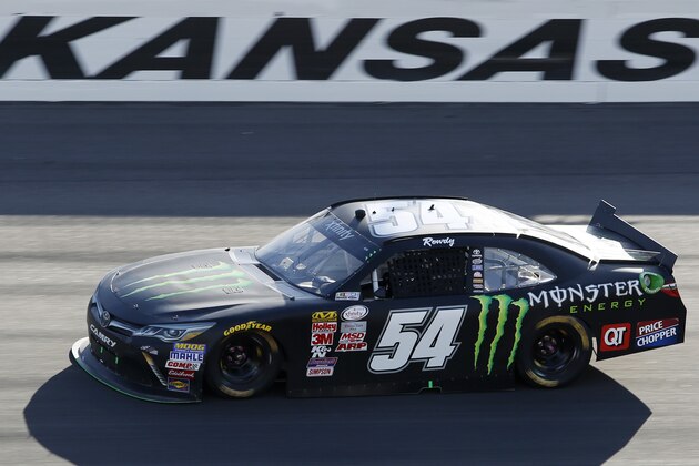 NASCAR Xfinity Series driver Kyle Busch heads into turn two in the Kansas Lottery 300 auto race at Kansas Speedway in Kansas City, Kan., Saturday, Oct. 17, 2015. (AP Photo/Colin E. Braley)